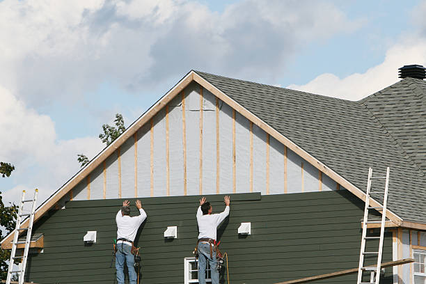 Professional Siding technician working in Winthrop, MN
